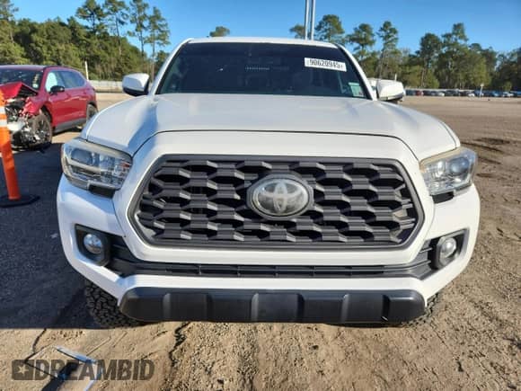 2020 Toyota Tacoma SR5 z VIN 3TMCZ5AN4LM294482, wystawiony jako Copart lot #90620945 z przebiegiem 135 293 mil mil oraz Szkoda całkowita • Salvage title. Historia ofert i sprzedaży dostępna na DreamBid. Obrazek 5.