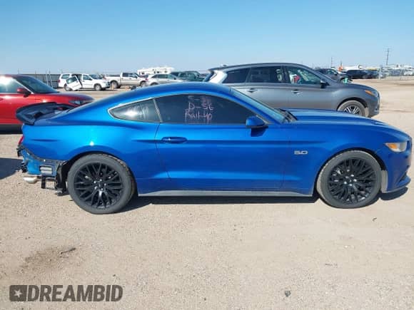 2017 Ford Mustang GT z VIN 1FA6P8CF0H5310934, wystawiony jako IAAI lot #43198857 z przebiegiem 92 428 mil mil oraz . Historia ofert i sprzedaży dostępna na DreamBid. Obrazek 13.