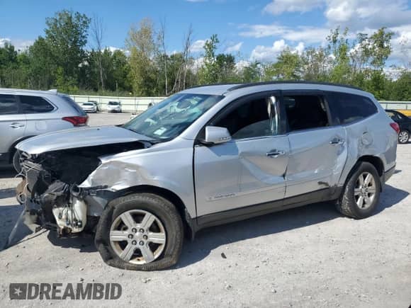 2009 Chevrolet Traverse 1LT with VIN 1GNEV23D59S102906, listed as a Copart auction lot 70272585 with 209,128 mi miles and Salvage title. Bid and sale history available at DreamBid. Image 1.