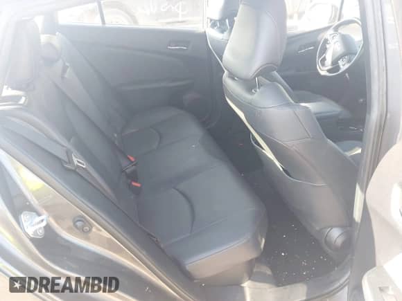 2021 Toyota Prius LE with VIN JTDL9MFU8M3028928, listed as a IAAI auction lot 43099318 with 72,833 mi miles and . Bid and sale history available at DreamBid. Image 8.