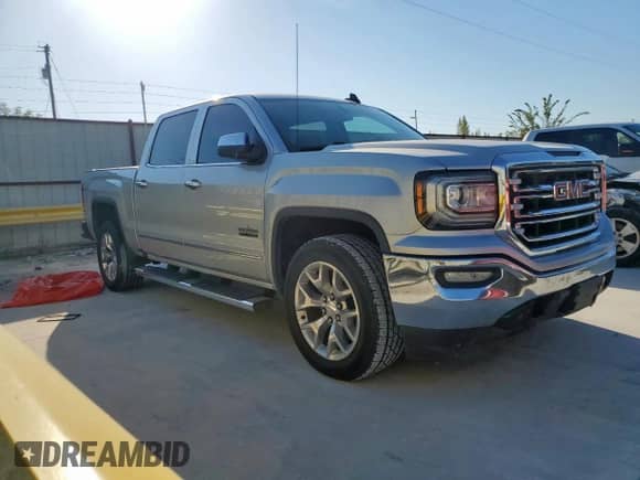 2018 GMC Sierra 1500 SLT z VIN 3GTP1NEC2JG312698, wystawiony jako Copart lot #82248715 z przebiegiem 296 885 mil mil oraz Czysty tytuł • Clean title. Historia ofert i sprzedaży dostępna na DreamBid. Obrazek 4.