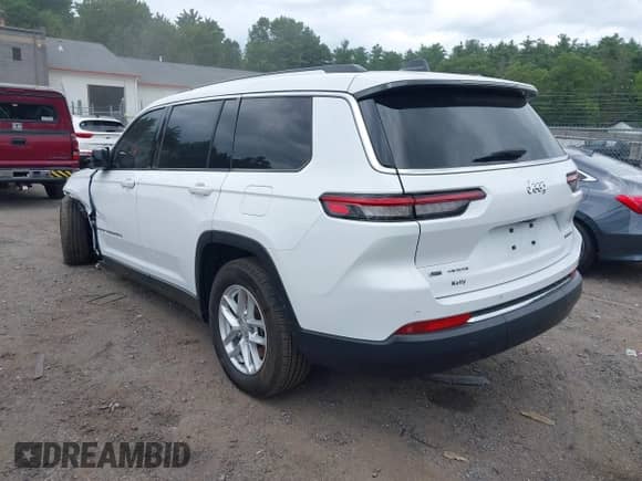 2023 Jeep Grand Cherokee Altitude with VIN 1C4RJKAG0P8780525, listed as a IAAI auction lot 42755675 with 31,912 mi miles and . Bid and sale history available at DreamBid. Image 3.