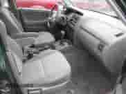 2002 Chevrolet Tracker with VIN 2CNBJ13C126946857, listed as a IAAI auction lot 41491975 with Not provided miles and . Bid and sale history available at DreamBid. Image 5.