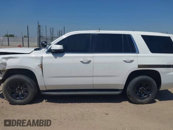 2015 Chevrolet Tahoe Commercial с VIN 1GNLC2ECXFR673084, выставлен на аукционе IAAI как лот 41881353 с пробегом 256 096 миль миль и . История ставок и продаж доступна на DreamBid. Изображение 14.
