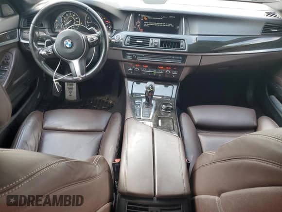 2016 BMW 5 Series 550i xDrive with VIN WBAKP9C55GD981149, listed as a Copart auction lot 65976265 with 121,838 mi miles and Salvage title. Bid and sale history available at DreamBid. Image 8.
