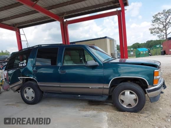 1996 Chevrolet Tahoe with VIN 1GNEK13R4TJ421208, listed as a IAAI auction lot 42716980 with 202,715 mi miles and . Bid and sale history available at DreamBid. Image 14.
