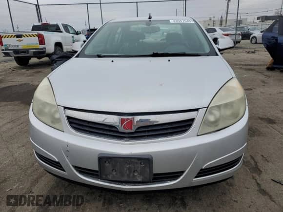 2009 Saturn Aura XE with VIN 1G8ZS57B09F158011, listed as a Copart auction lot 69934905 with 203,855 mi miles and Salvage title. Bid and sale history available at DreamBid. Image 5.
