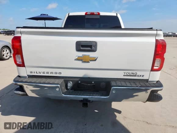 2017 Chevrolet Silverado 1500 LTZ with VIN 3GCPCSECXHG145834, listed as a Copart auction lot 65348985 with 153,460 mi miles and Salvage title. Bid and sale history available at DreamBid. Image 6.
