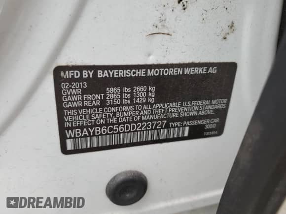 2013 BMW 7 Series 750i xDrive with VIN WBAYB6C56DD223727, listed as a Copart auction lot 45298235 with 113,635 mi miles and Salvage title. Bid and sale history available at DreamBid. Image 12.