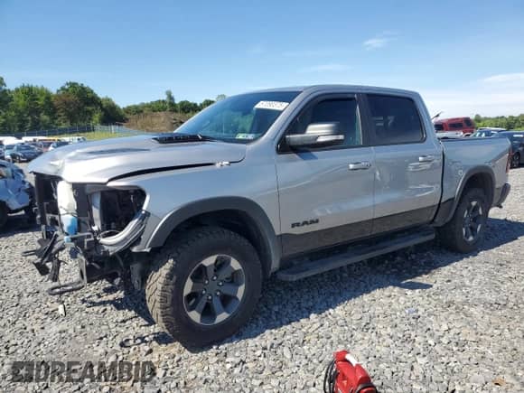 2021 Ram 1500 Rebel z VIN 1C6SRFLT2MN557158, wystawiony jako Copart lot #67090375 z przebiegiem 48 958 mil mil oraz Szkoda całkowita • Salvage title. Historia ofert i sprzedaży dostępna na DreamBid. Obrazek 1.