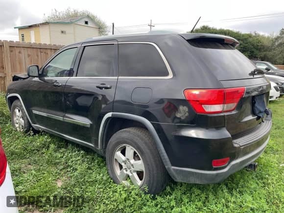 2012 Jeep Grand Cherokee Laredo z VIN 1C4RJEAG8CC119401, wystawiony jako IAAI lot #41724335 z przebiegiem 233 265 mil mil oraz . Historia ofert i sprzedaży dostępna na DreamBid. Obrazek 3.