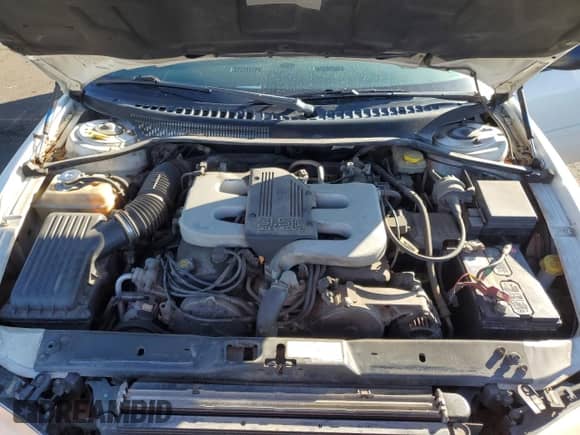 1997 Dodge Intrepid z VIN 2B3HD46F4VH708878, wystawiony jako Copart lot #76841674 z przebiegiem 93 938 mil mil oraz Szkoda całkowita • Salvage title. Historia ofert i sprzedaży dostępna na DreamBid. Obrazek 12.