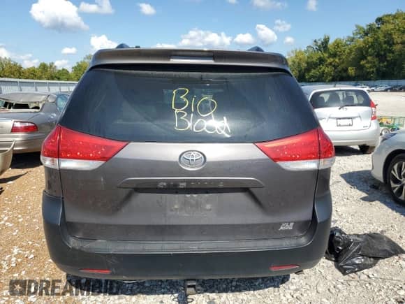 2012 Toyota Sienna XLE with VIN 5TDDK3DC5CS043722, listed as a Copart auction lot 81994915 with 228,523 mi miles and Salvage title. Bid and sale history available at DreamBid. Image 6.