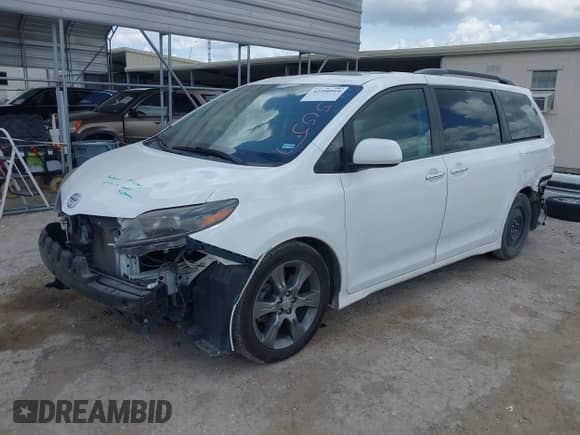 2015 Toyota Sienna SE with VIN 5TDXK3DC9FS669405, listed as a IAAI auction lot 42590910 with 82,127 mi miles and . Bid and sale history available at DreamBid. Image 18.