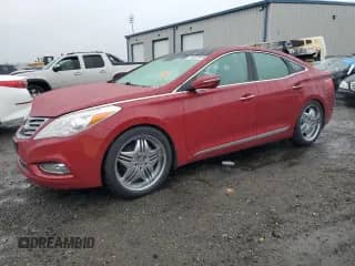 2013 Hyundai Azera with VIN KMHFH4JG1DA328688, listed as a Copart auction lot 81057915 with 129,878 mi miles and Salvage title. Bid and sale history available at DreamBid. Image 1.