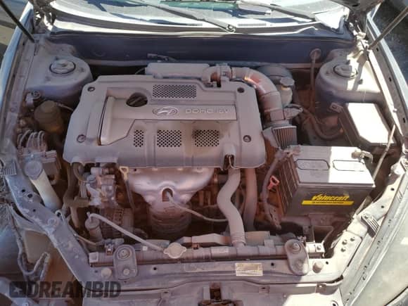 2007 Hyundai Tiburon GS z VIN KMHHM66D27U236507, wystawiony jako Copart lot #41334155 z przebiegiem 97 162 mil mil oraz Szkoda całkowita • Salvage title. Historia ofert i sprzedaży dostępna na DreamBid. Obrazek 12.