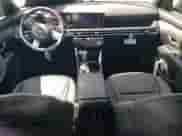 2025 Hyundai Tucson SEL with VIN 5NMJFCDE1SH497492, listed as a Copart auction lot 70523465 with 18 mi miles and Salvage title. Bid and sale history available at DreamBid. Image 8.