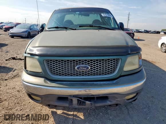 1999 Ford F-150 XL z VIN 1FTRX18L1XKA68328, wystawiony jako Copart lot #67615095 z przebiegiem Nie podano mil oraz Szkoda całkowita • Salvage title. Historia ofert i sprzedaży dostępna na DreamBid. Obrazek 5.