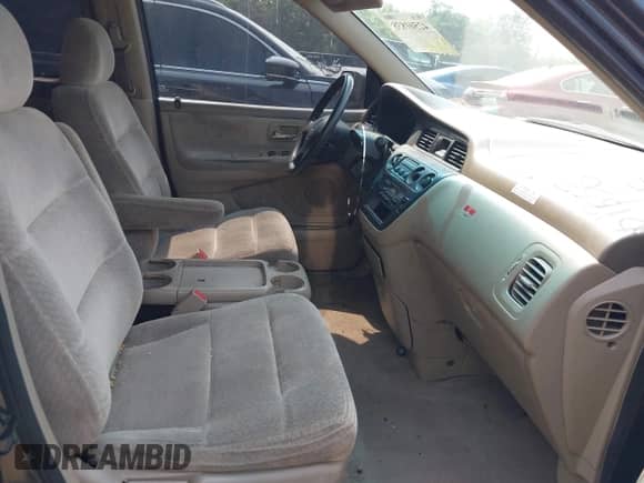 1999 Honda Odyssey LX with VIN 2HKRL1854XH507744, listed as a IAAI auction lot 42501838 with 283,556 mi miles and . Bid and sale history available at DreamBid. Image 5.