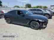 2022 BMW i4 eDrive40 with VIN WBY73AW05NFN10284, listed as a Copart auction lot 57851335 with 22,431 mi miles and Salvage title. Bid and sale history available at DreamBid. Image 4.