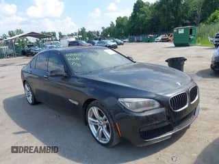 2013 BMW 7 Series 740i z VIN WBAYA6C50DD143312, wystawiony jako IAAI lot #42846115 z przebiegiem 164 978 mil mil oraz . Historia ofert i sprzedaży dostępna na DreamBid. Obrazek 1.