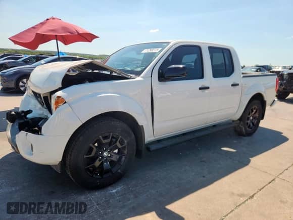 2021 Nissan Frontier SV with VIN 1N6ED0EA7MN723443, listed as a Copart auction lot 71290275 with 57,013 mi miles and Salvage title. Bid and sale history available at DreamBid. Image 1.