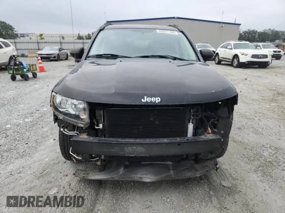 2014 Jeep Compass Sport с VIN 1C4NJCBA7ED515572, выставлен на аукционе Copart как лот 68657185 с пробегом 158 857 миль миль и Списание • Salvage title. История ставок и продаж доступна на DreamBid. Изображение 5.