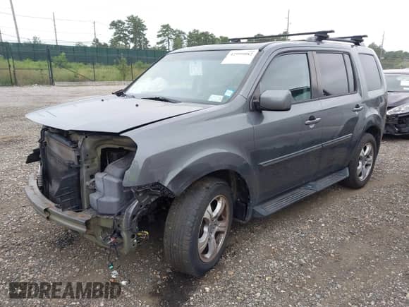 2013 Honda Pilot EX-L with VIN 5FNYF4H56DB002982, listed as a IAAI auction lot 42999082 with 113,189 mi miles and . Bid and sale history available at DreamBid. Image 2.