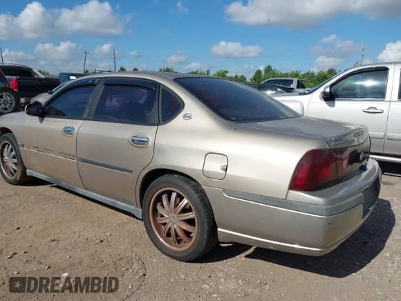 2003 Chevrolet Impala with VIN 2G1WF52E339402824, listed as a IAAI auction lot 42976844 with 183,496 mi miles and . Bid and sale history available at DreamBid. Image 6.