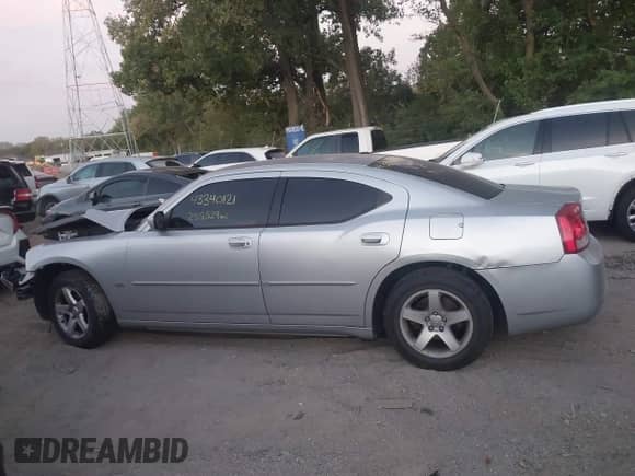 2010 Dodge Charger SXT с VIN 2B3CA3CV8AH309572, выставлен на аукционе IAAI как лот 43340121 с пробегом 255 529 миль миль и . История ставок и продаж доступна на DreamBid. Изображение 15.