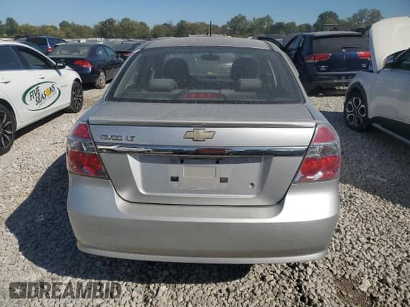 2011 Chevrolet Aveo 1LT with VIN KL1TD5DE4BB142595, listed as a Copart auction lot 73681244 with 142,436 mi miles and Salvage title. Bid and sale history available at DreamBid. Image 6.
