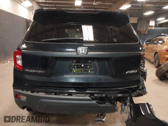 2021 Honda Passport EX-L с VIN 5FNYF8H54MB036555, выставлен на аукционе IAAI как лот 42493765 с пробегом 61 454 миль миль и . История ставок и продаж доступна на DreamBid. Изображение 17.