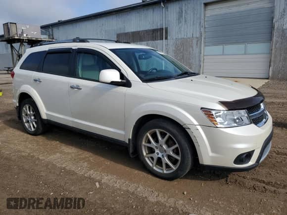2013 Dodge Journey R/T with VIN 3C4PDDFG8DT540669, listed as a Copart auction lot 64067215 with 124,135 mi miles and Clean title. Bid and sale history available at DreamBid. Image 4.