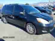 2009 Toyota Sienna XLE z VIN 5TDZK22C69S273555, wystawiony jako IAAI lot #41276221 z przebiegiem 129 160 mil mil oraz . Historia ofert i sprzedaży dostępna na DreamBid. Obrazek 1.