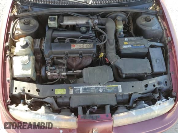 1996 Saturn SL with VIN 1G8ZK5278TZ334649, listed as a Copart auction lot 54098725 with 156,012 mi miles and Salvage title. Bid and sale history available at DreamBid. Image 11.