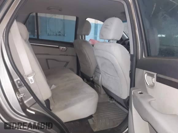 2009 Hyundai Santa Fe GLS z VIN 5NMSG13D09H254779, wystawiony jako IAAI lot #43541006 z przebiegiem 213 396 mil mil oraz . Historia ofert i sprzedaży dostępna na DreamBid. Obrazek 8.