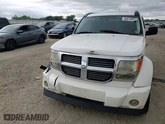 2007 Dodge Nitro SLT with VIN 1D8GU58K97W657068, listed as a Copart auction lot 66810925 with 191,588 mi miles and Salvage title. Bid and sale history available at DreamBid. Image 14.