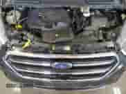 2018 Ford Escape SE with VIN 1FMCU9GD2JUC25153, listed as a Copart auction lot 87018485 with 104,172 mi miles and Salvage title. Bid and sale history available at DreamBid. Image 12.