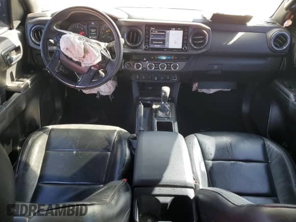 2021 Toyota Tacoma TRD Off Road with VIN 3TMCZ5AN4MM424715, listed as a Copart auction lot 86407685 with 55,946 mi miles and Salvage title. Bid and sale history available at DreamBid. Image 8.