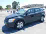 2009 Dodge Caliber SXT with VIN 1B3HB48C29D187901, listed as a IAAI auction lot 42727025 with 112,799 mi miles and . Bid and sale history available at DreamBid. Image 2.