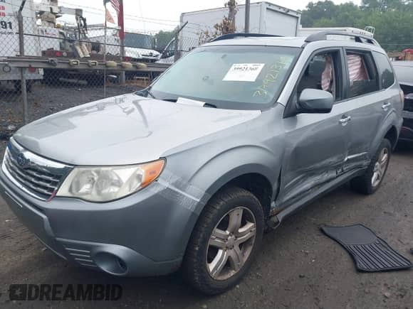 2009 Subaru Forester X with VIN JF2SH63659H759425, listed as a IAAI auction lot 39921368 with 216,092 mi miles and . Bid and sale history available at DreamBid. Image 2.