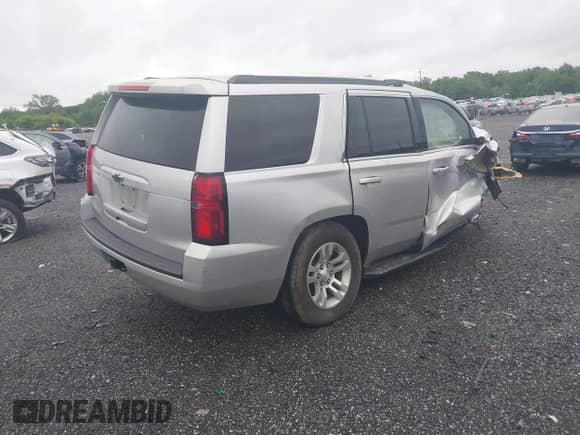 2019 Chevrolet Tahoe LS with VIN 1GNSKAKC2KR185738, listed as a IAAI auction lot 42325196 with Not provided miles and . Bid and sale history available at DreamBid. Image 4.