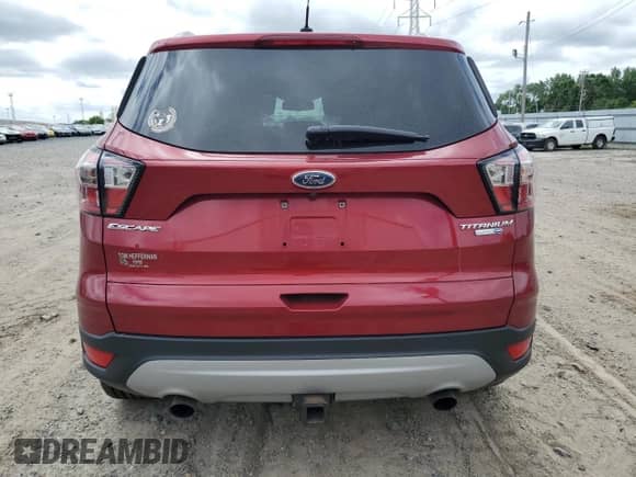 2017 Ford Escape Titanium with VIN 1FMCU9J92HUB62618, listed as a Copart auction lot 61932215 with 122,189 mi miles and Salvage title. Bid and sale history available at DreamBid. Image 6.