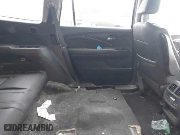 2017 Honda Pilot EX-L with VIN 5FNYF5H61HB018057, listed as a IAAI auction lot 42422940 with 117,111 mi miles and . Bid and sale history available at DreamBid. Image 8.