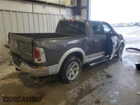 2014 Ram 1500 Laramie with VIN 1C6RR7NT5ES375183, listed as a Copart auction lot 85163365 with 149,376 mi miles and Salvage title. Bid and sale history available at DreamBid. Image 3.