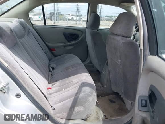 2005 Chevrolet Malibu Classic z VIN 1G1ND52F15M229451, wystawiony jako IAAI lot #42110203 z przebiegiem 153 682 mil mil oraz . Historia ofert i sprzedaży dostępna na DreamBid. Obrazek 8.