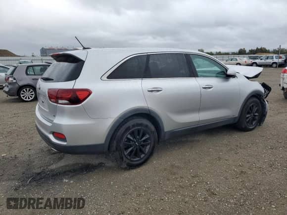 2020 Kia Sorento LX с VIN 5XYPGDA53LG610162, выставлен на аукционе Copart как лот 84770745 с пробегом 99 763 миль миль и Списание • Salvage title. История ставок и продаж доступна на DreamBid. Изображение 3.