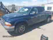2002 Dodge Dakota SLT с VIN 1B7HL48N32S708719, выставлен на аукционе IAAI как лот 42027763 с пробегом 217 797 миль миль и . История ставок и продаж доступна на DreamBid. Изображение 2.