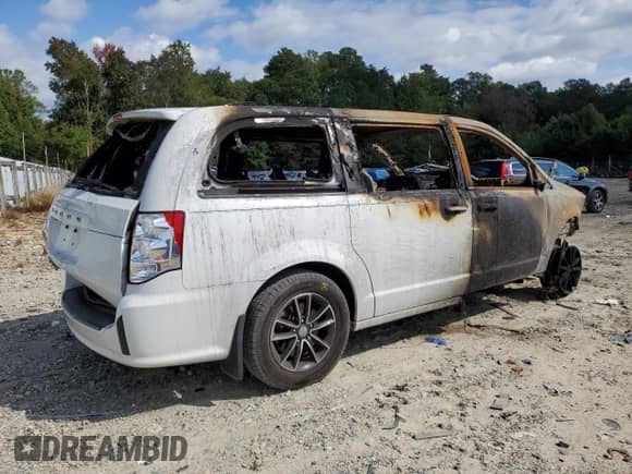 2018 Dodge Caravan with VIN NOVIN000074032014, listed as a Copart auction lot 74032014 with Not provided miles and Non repairable. Bid and sale history available at DreamBid. Image 3.