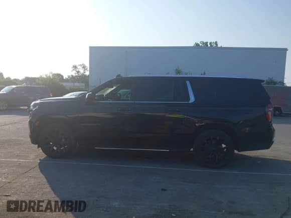 2023 Chevrolet Suburban LT with VIN 1GNSKCKD4PR250410, listed as a IAAI auction lot 42404471 with 71,552 mi miles and . Bid and sale history available at DreamBid. Image 14.
